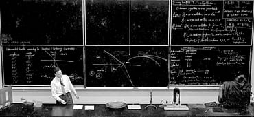 Richard Feynman lecturing at Caltech, February 9, 1962, standing before chalkboards filled with optics equations, Ptolemy's refraction data, and the principle of superposition.