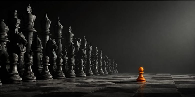 A lone orange pawn faces a massive wall of gray stone chess pieces on a dark board, one small operator against the institutions.