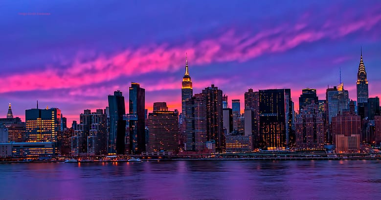 Pink sunset over the New York City skyline, opening a review of hotel marketing trends 2026