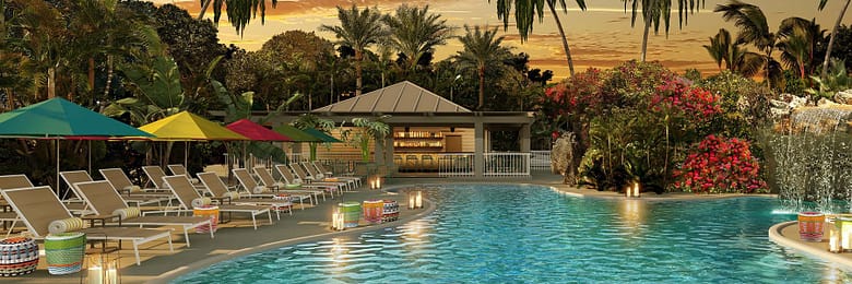 Luxury resort pool with guest amenities and scenic view