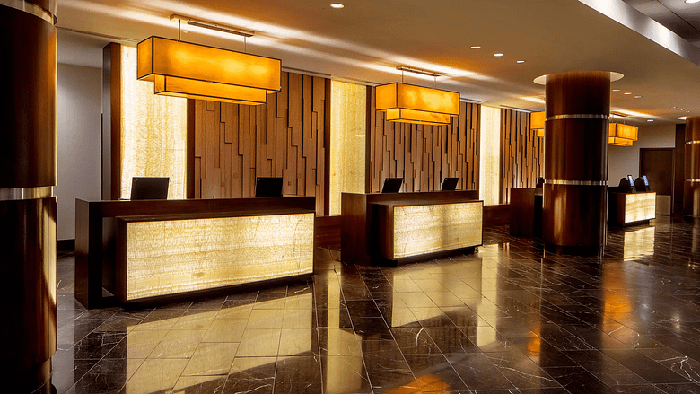 Luxury resort front desk reflecting a premium guest experience and high-touch hospitality service
