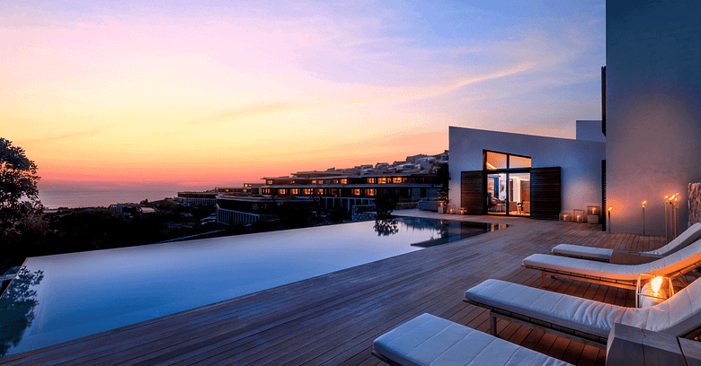 Luxury resort pool with guest amenities and scenic view