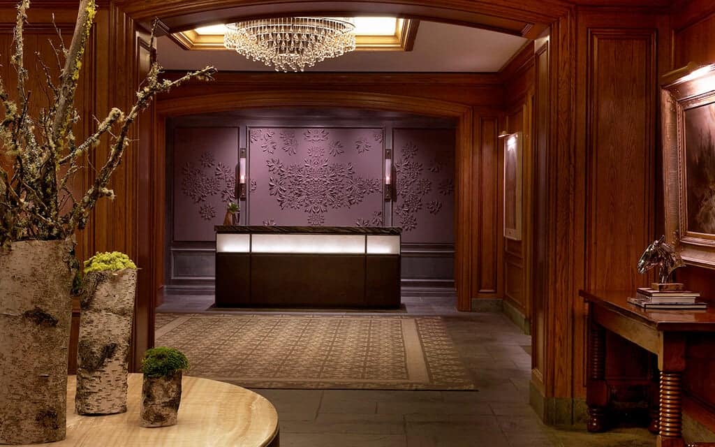Luxury hotel reception area representing direct guest relationship ownership